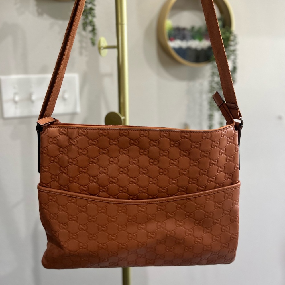 Authentic Gucci Crossbody Messenger bag in brown signature monogram leather